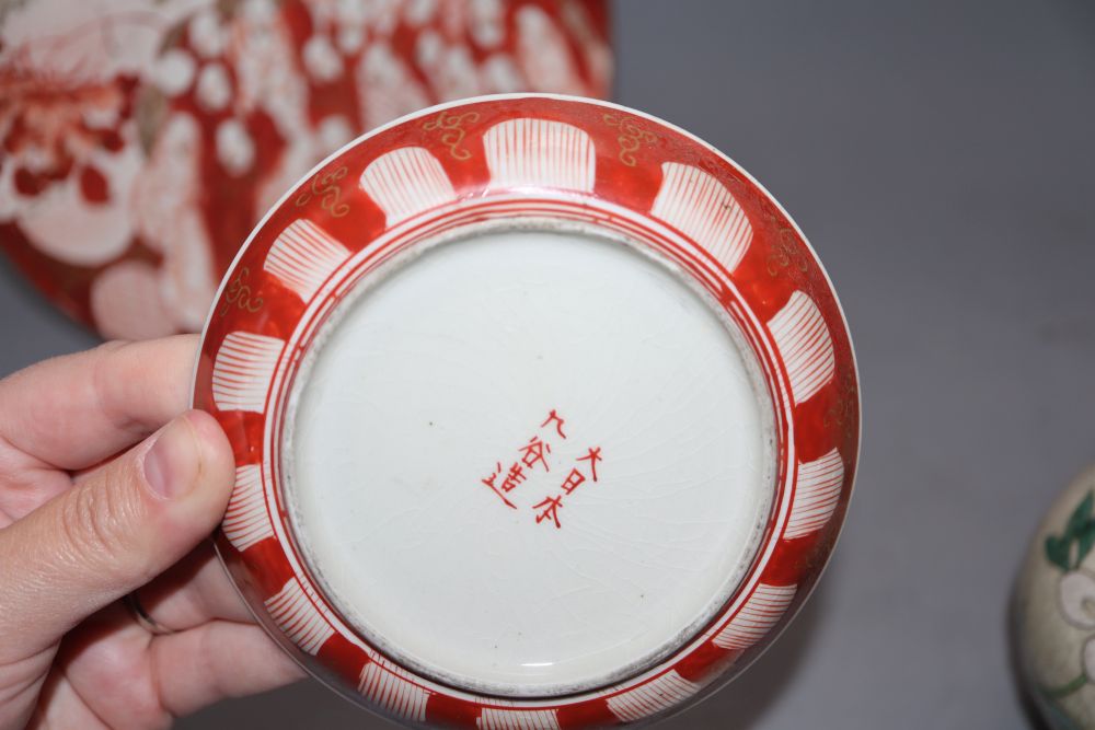 An 18th century Japanese blue and white dish, a studio vase and a Kutani plate and tea bowl and saucer, tallest 20cm